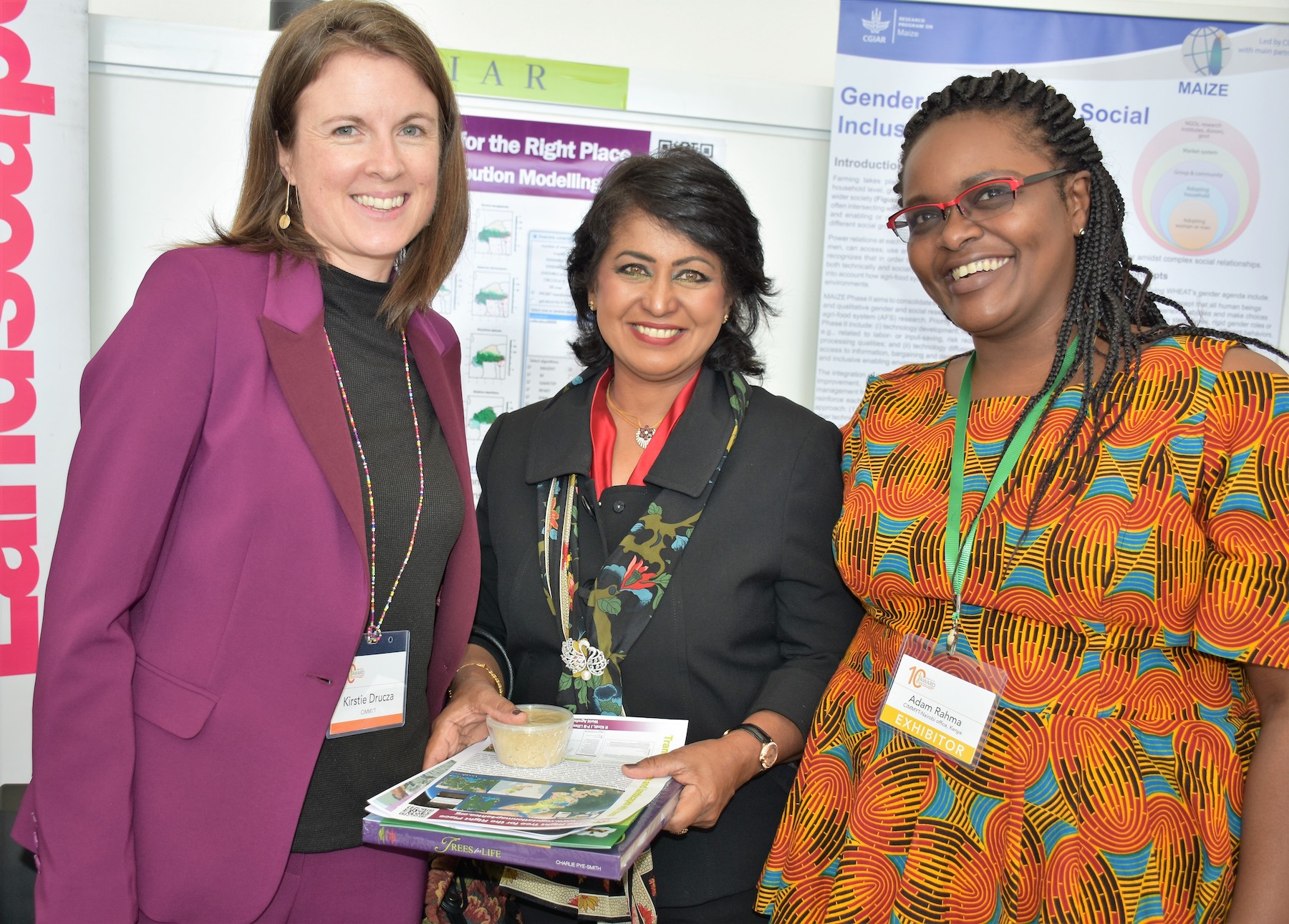 Kristie Drucza (left) and Rahma Adam (right) had a chance to share CIMMYT’s gender work with the former president of Mauritius, Ameenah Gurib-Fakim, at AWARD’s tenth anniversary event in Nairobi. (Photo: Joshua Masinde/CIMMYT)