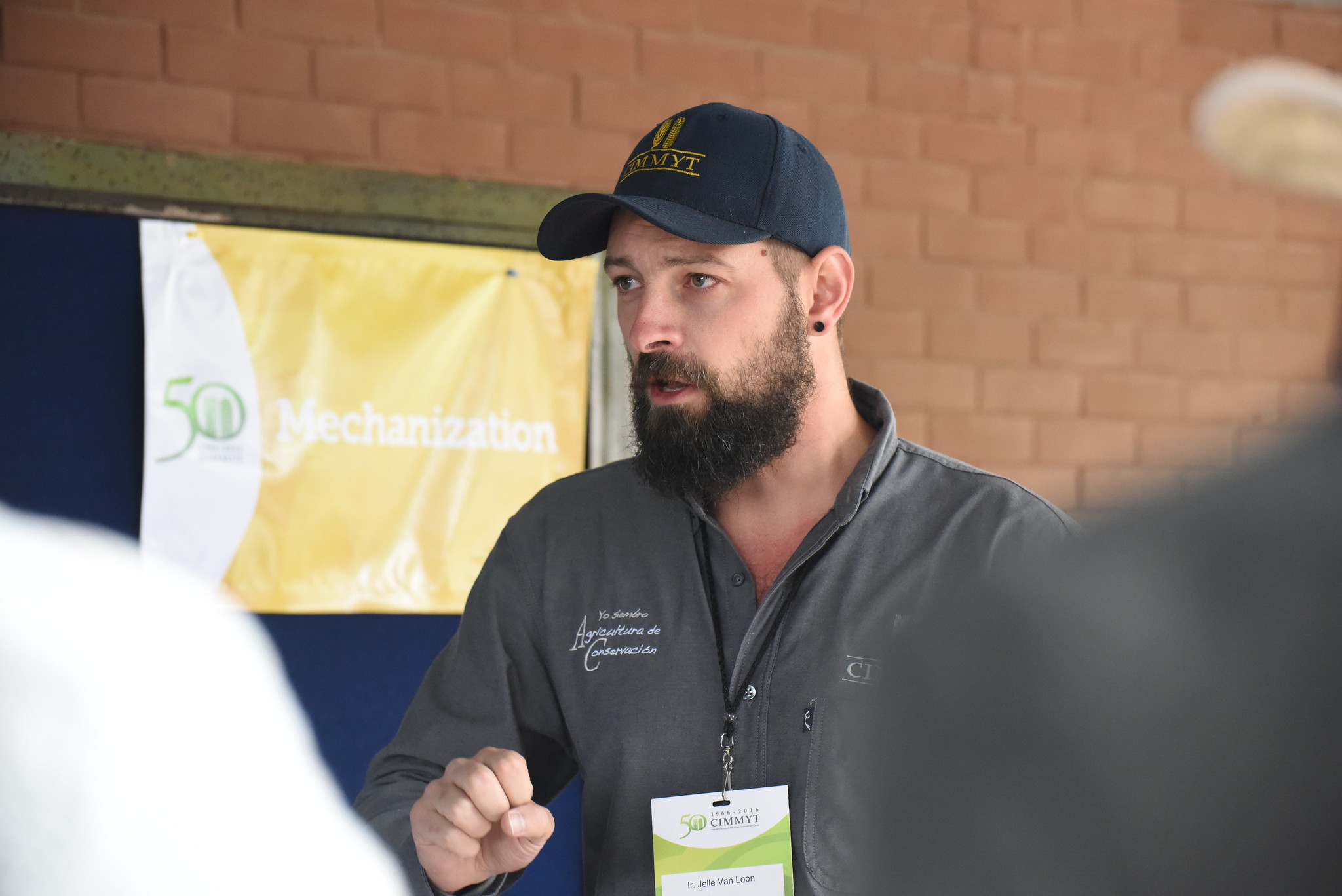 Jelle Van Loon demonstrates machinery for visitors at CIMMYT's global headquarters in Mexico. (Photo: Gerardo Mejía/CIMMYT)