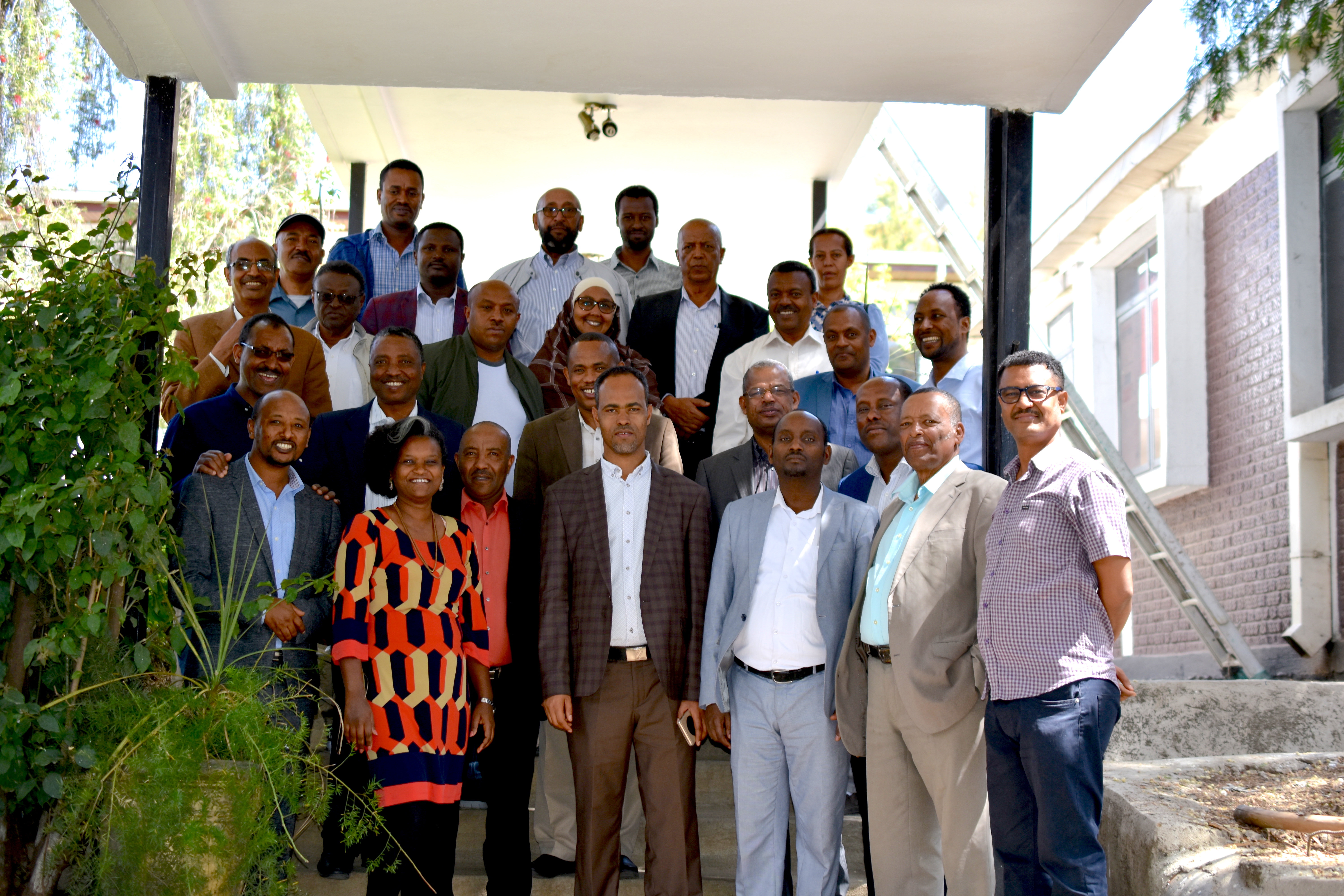 Workshop participants pose for a group photograph.