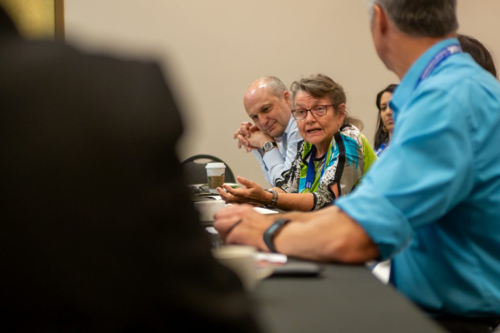 Linda McCandless (center) of Cornell University and David Hodson (left) of CIMMYT were among the panelists sharing tips on wheat news coverage at the journalist roundtable. (Photo: Matt Hayes/Cornell)