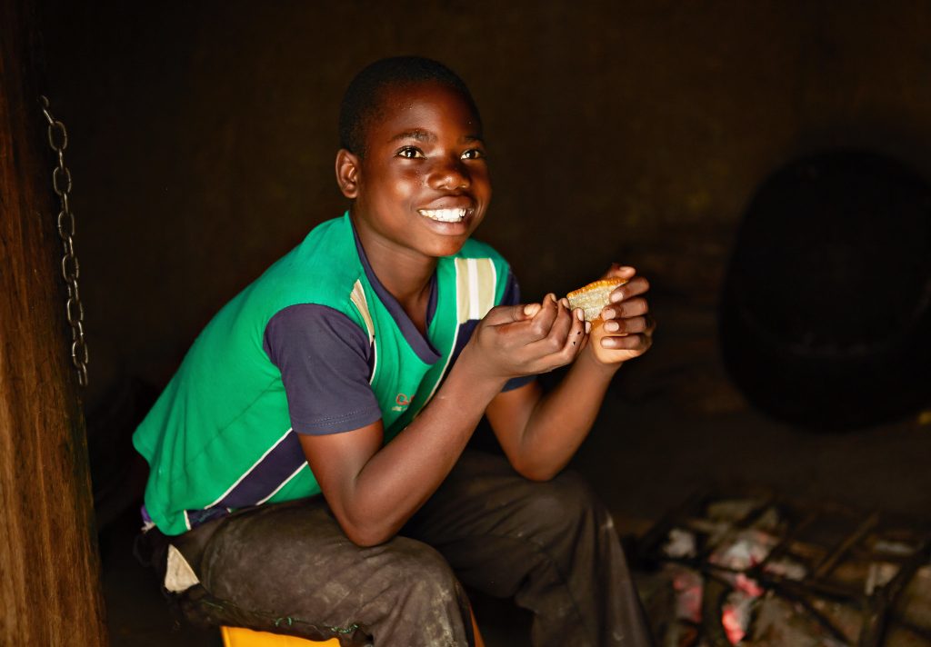 A 2015 study published in The Journal of Nutrition found that vitamin A-biofortified orange maize significantly improves visual functions in children, like night vision. (Photo: Libby Edwards/HarvestPlus)