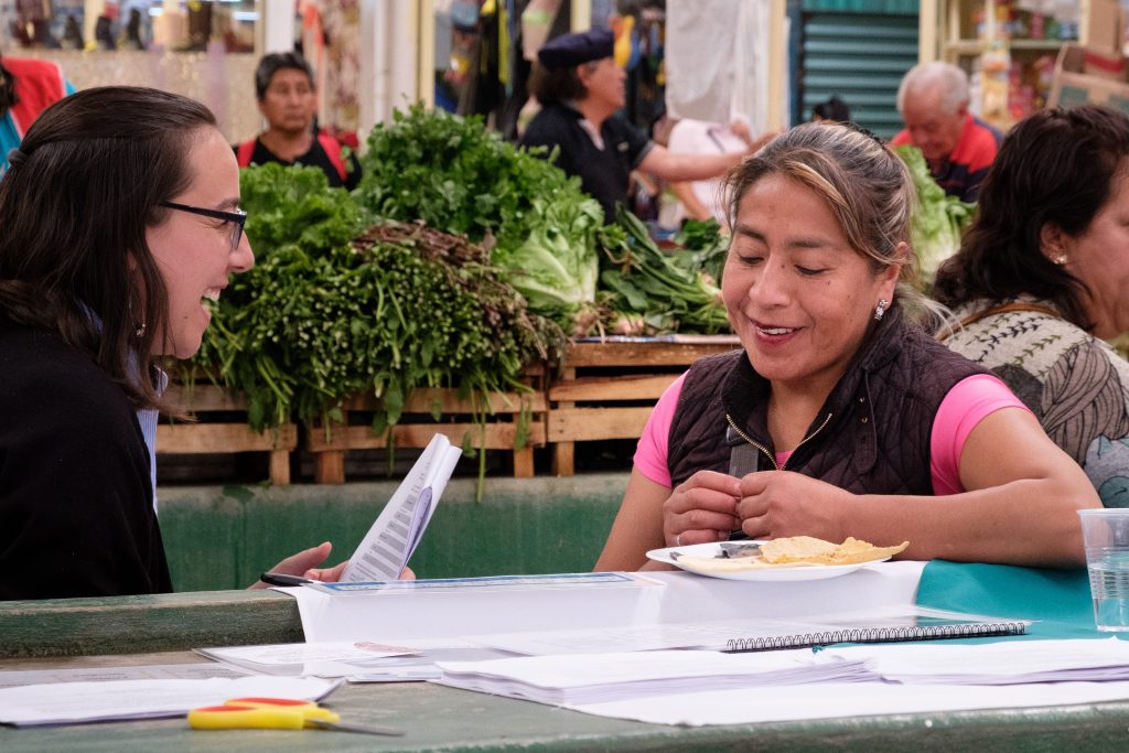 “As a Colombian, it really surprised me that Mexicans were able to distinguish between white and blue maize tortillas even when blindfolded! It really shows the importance of maize to their diet and culture,” said Diana Ospina Rojas (left), research assistant and interviewer. (Photo: Carolyn Cowan/CIMMYT)