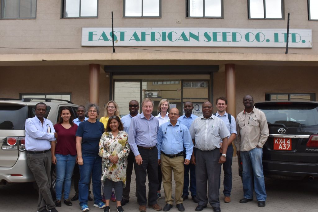 CIMMYT board members and staff stand for a group photo outside the offices of East African Seed. (Photo: Jerome Bossuet/CIMMYT)