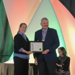 Alex Morgunov (center) receives his Crop Science Society of America Fellow certificate. (Photo: Johanna Franziska Braun/CIMMYT)