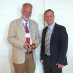 Thomas Payne (left) stands for a photo with CIMMYT’s Director of Genetic Resources Kevin Pixley.