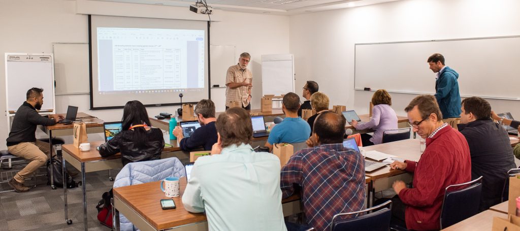 Members of the Enterprise Breeding System advisory committee listen to a presentation from Tom Hagen. (Photo: Alfonso Cortés/CIMMYT)