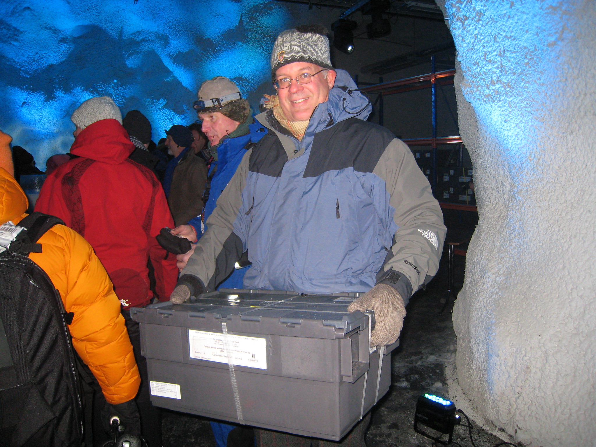 Tom Payne at the Global Seed Vault in Svalbard, Norway, for the official opening ceremony in 2008. He holds one of the sealed boxes used to store the nearly 50,000 unique maize and wheat seed collections deposited by CIMMYT. (Photo: Thomas Lumpkin/CIMMYT)