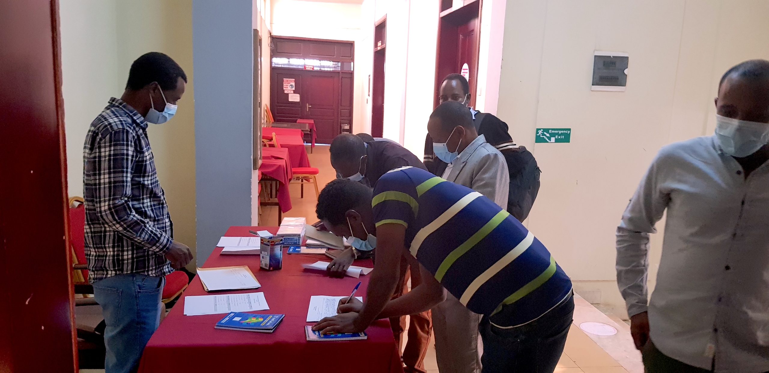 Participants in the ADAPT-Wheat workshop record their attendance (Photo: Enawgaw Sisay/CIMMYT)