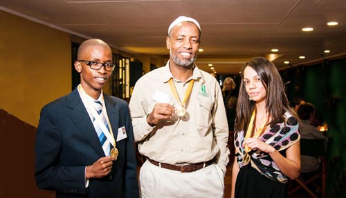 Abdu Rahman Beshir (in the middle) with winners in BSc Hons and MSc categories