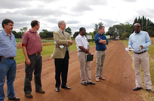 Physiologist Jill Cairns talks about climate change with the Swiss Ambassador.