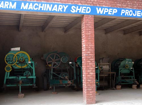 Wheat Productivity Enhancement Program (WPEP) Farm Machinery Shed at the Wheat Research Institute, Faisalabad. Photo by Miriam Shindler.
