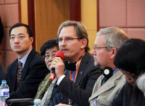 Dan Jeffers (second from the left) attends a meeting in the Great Hall of China. Source: CCTV13