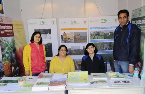 India staff members (L-R) Anuradha Dhar, Meenakshi Chandiramani, Anu Raswant and Kailash Kalvaniya at the exhibit stall in the Mela at IARI, Pusa Campus.Photo: BISA/CIMMYT