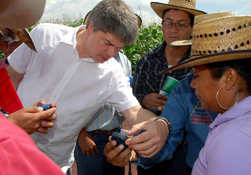 The head of CIMMYT's GIS unit, Kai Sonder, demonstrating the use of GPS. 
