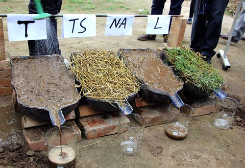 Runoff in action during the rainfall simulation on tilled soil (T), tilled soil with straw cover (TS), non-agricultural soil (NA) and recently mowed lucern (L). Photo: Stephen Yeboah/GAU