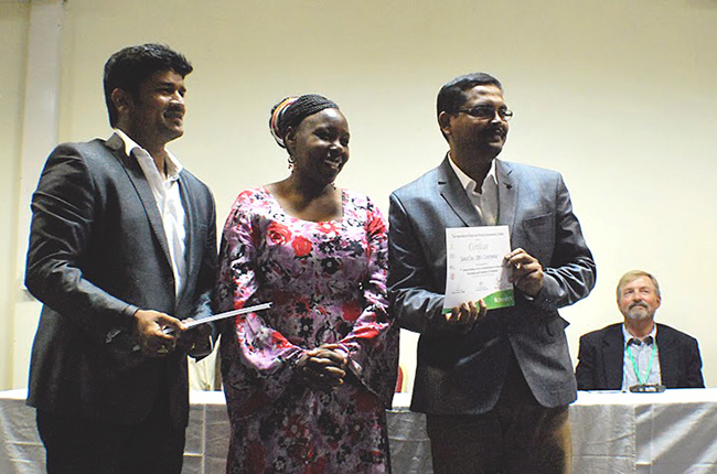 Certificate distribution to trainees: Sridhar Bhavani (CIMMYT), Immaculate Maina (Center Director, KALRO) and Saikat Das (trainee from India). Photo: Marianna Myer.