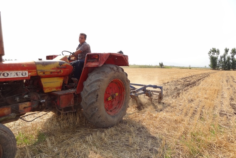 Above, a farmer in Golestan Province in Iran practicing minimum tillage, a conservation agriculture technique that conserves soil and saves time. Photo: M.E. Asadi