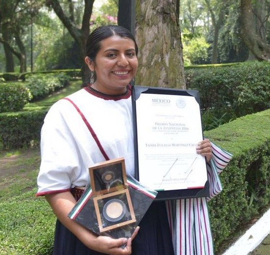 Tania Martínez, PhD fellow with CIMMYT, holding her national youth award for outstanding performance in academic achievement. Photo courtesy of Tania Martínez.