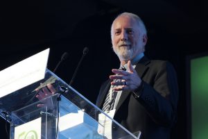 Neal Gutterson, vice president of research at DuPont Pioneer, delivers a presentation on Crispr-Cas at CIMMYT's 50th anniversary conference. CIMMYT/Alfonso Cortes