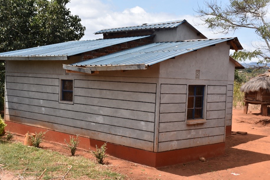 A rear view of Kivanga’s new home, built from the income generated using improved maize varieties.