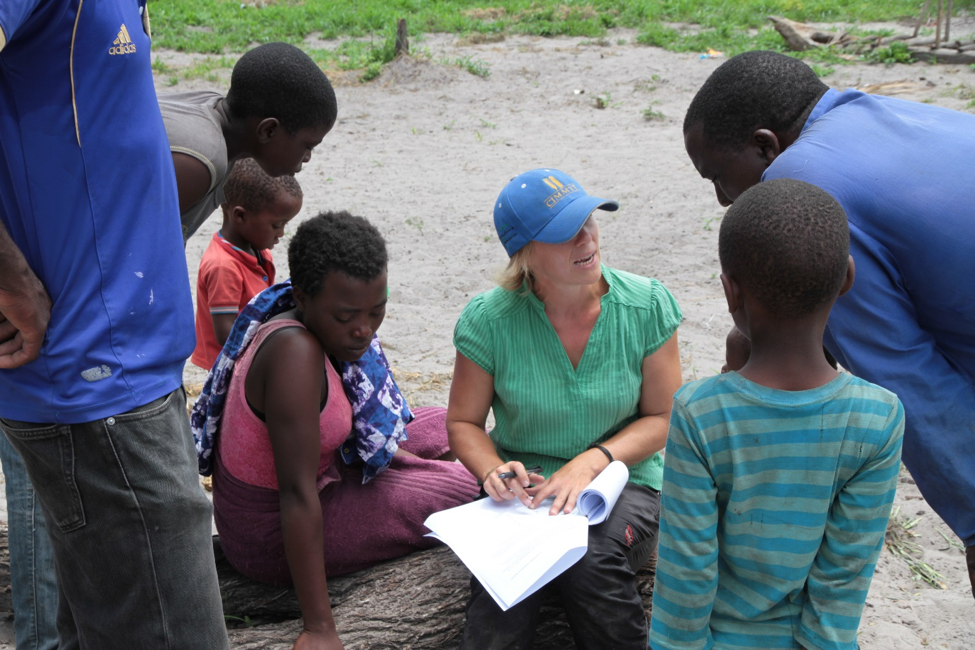 Cheesman discusses with farmer what data he should be recording from his demonstration field. Photo: Pietro Bomio