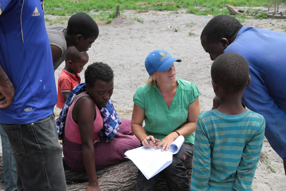 Cheesman discusses with farmer what data he should be recording from his demonstration field. Photo: Pietro Bomio 