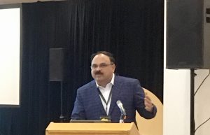 Scientist B.M. Prasanna, director of the Global Maize Program at CIMMYT and the CGIAR Research Program on Maize, speaks at a Borlaug Dialogue side event about the fall armyworm with a panel of scientific experts. CIMMYT/Julie Mollins