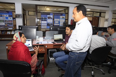 Suraya Parvin (left), Senior Scientific Officer of BARC, discussing with the facilitator in the training. Photo: Jitendra Raj Bajracharya/ICIMOD.